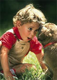 child and puppy