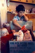 Two children with groceries