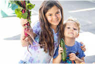 Child Care Bulletins (CCB) photo tile with young girl in a library. 