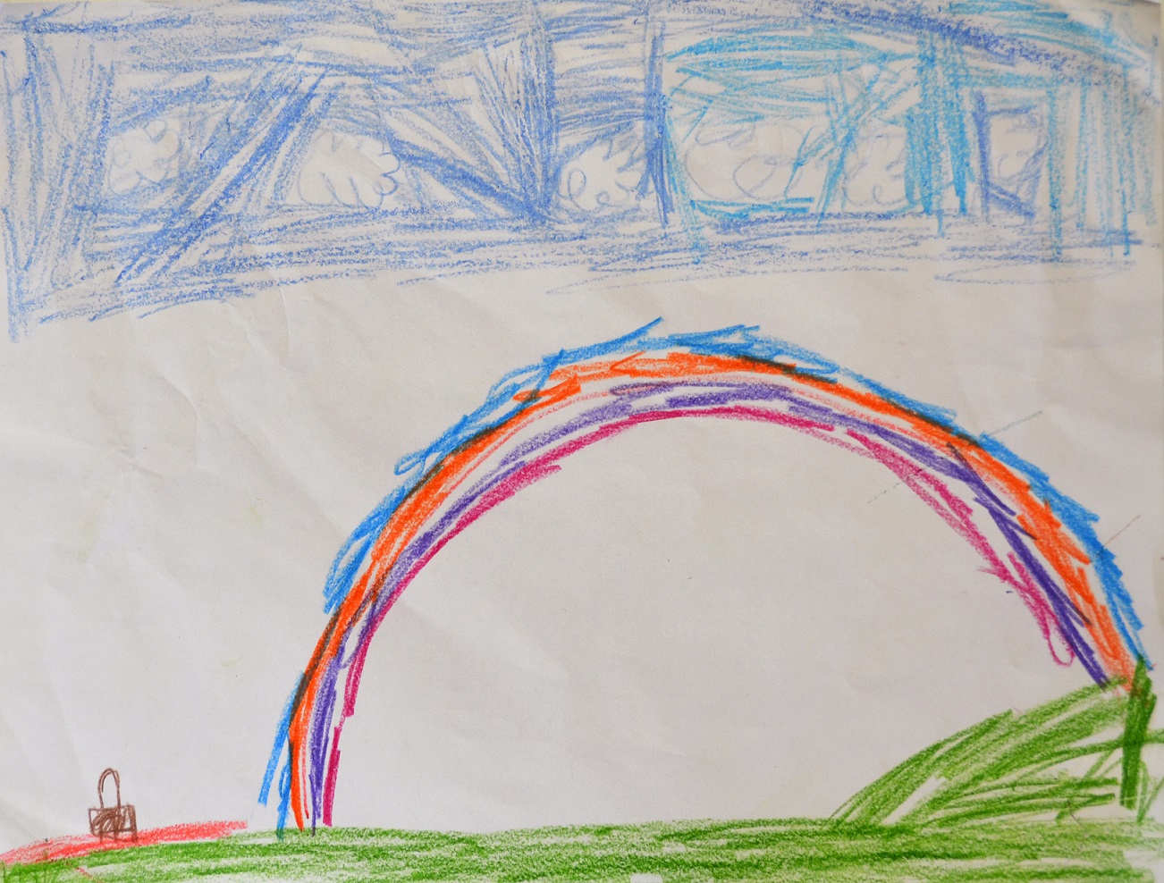 Kid Drawing of rainbow during picnic