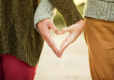 Picture of two hands forming a heart