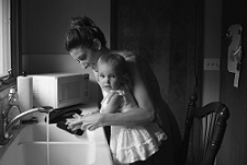 Black and white photo of parent and baby